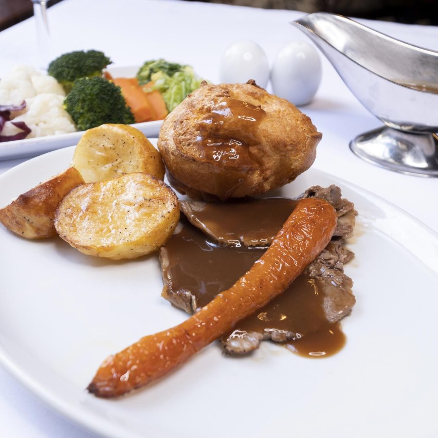 Roast Beef served with Roast Potatoes Yorkshire Pudding Gravy and a Selection of Vegetables in the Olive Tree Restaurant